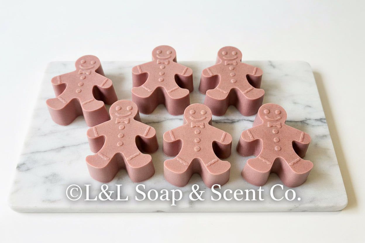 Gingerbread scented brown shea butter soap in the shape of a gingerbread man