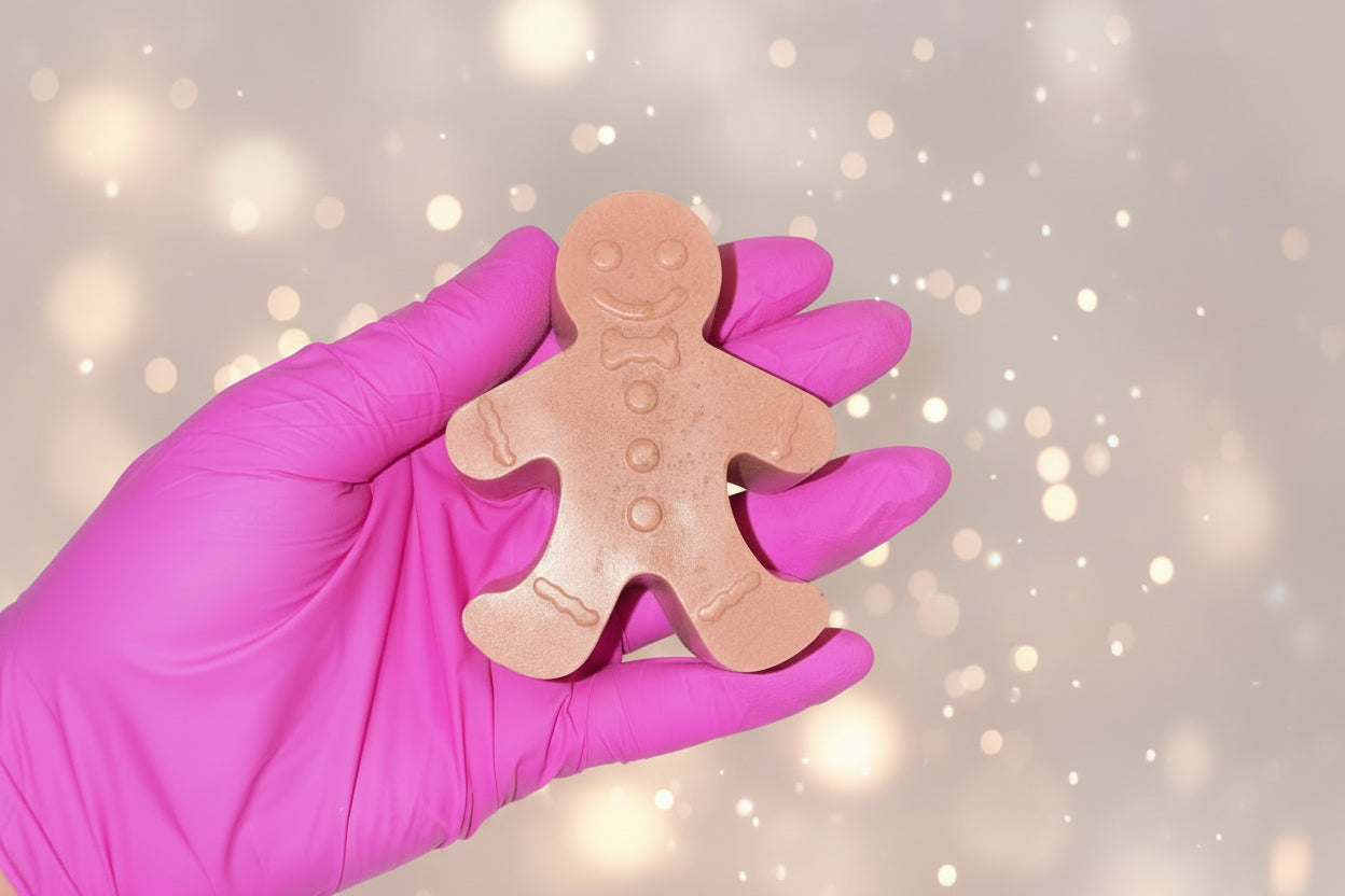 Gingerbread scented brown shea butter soap in the shape of a gingerbread man