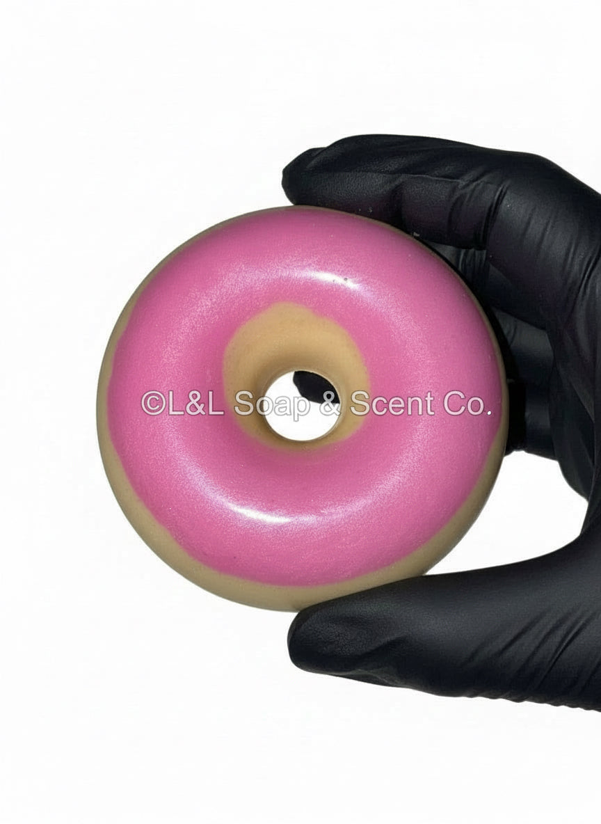 Donut shape with pink frosting coffee scented goat milk soap 