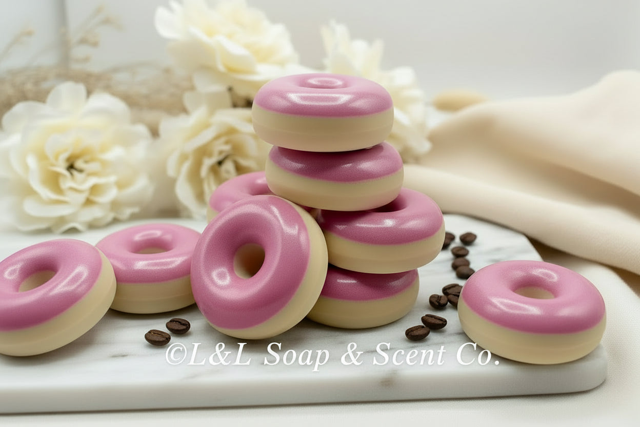 Donut shape with pink frosting coffee scented goat milk soap 