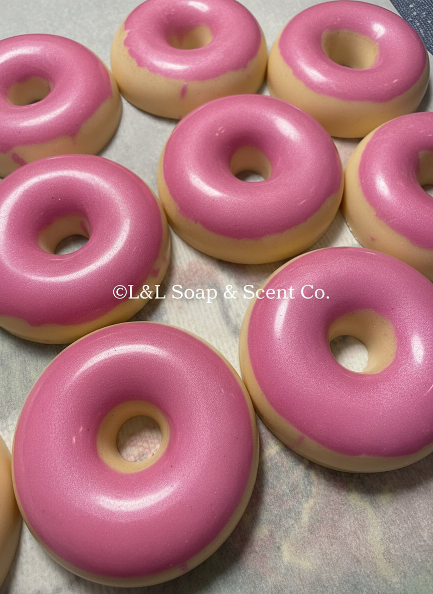 Donut shape with pink frosting coffee scented goat milk soap 