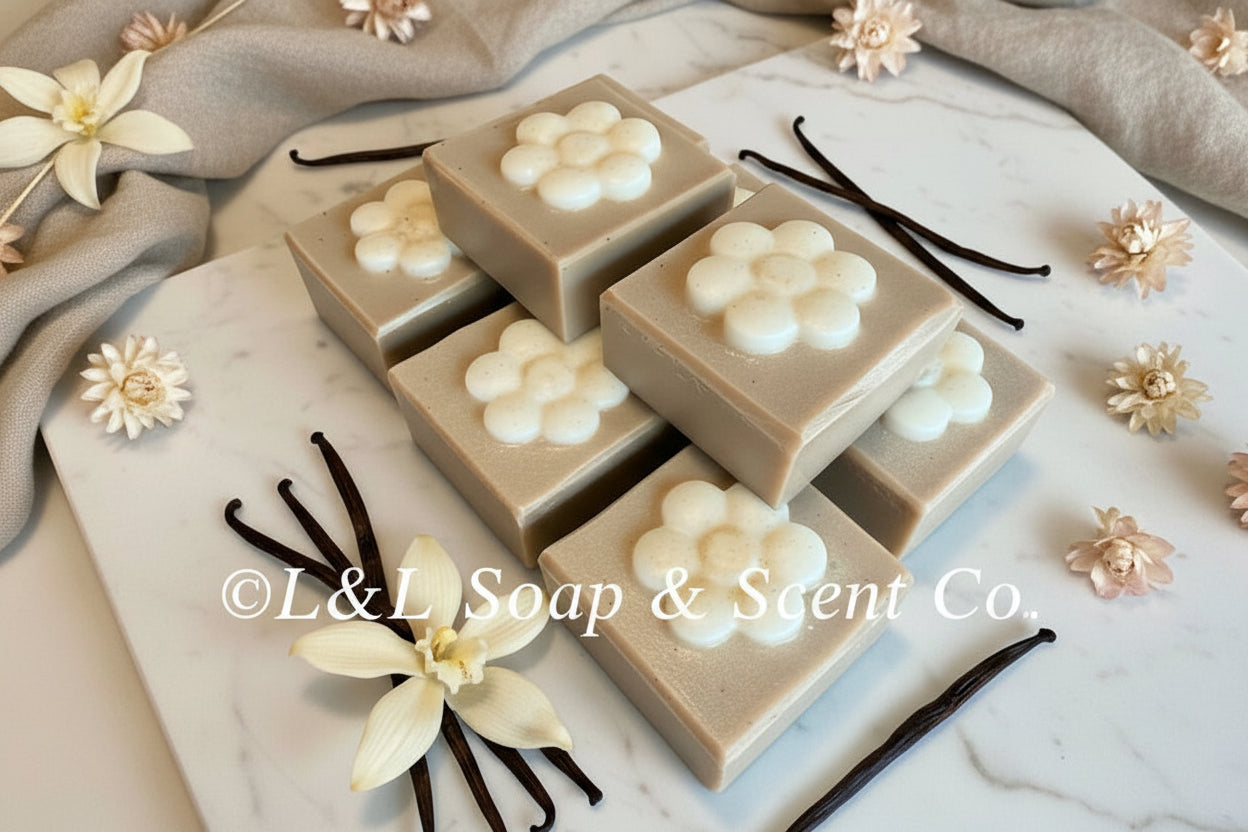 Brown square shape lavender vanilla essential oil Shea butter soaps with white flower in middle.