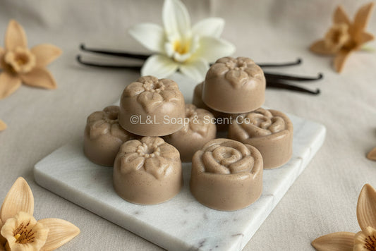 Small brown round flower shape lavender vanilla essential oil Shea butter soaps